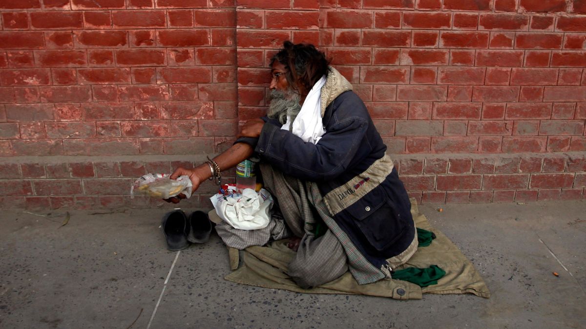A man begs on a street in the old city of Lahore. Reuters/File Photo
A man begs on a street in the old city of Lahore. Reuters/File Photo
