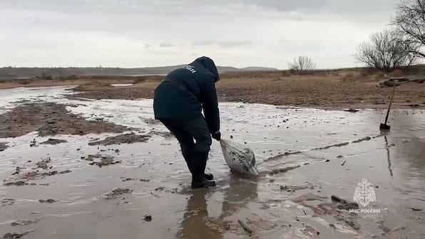 Russia hurries to clean up devastating oil spill along Black Sea coast