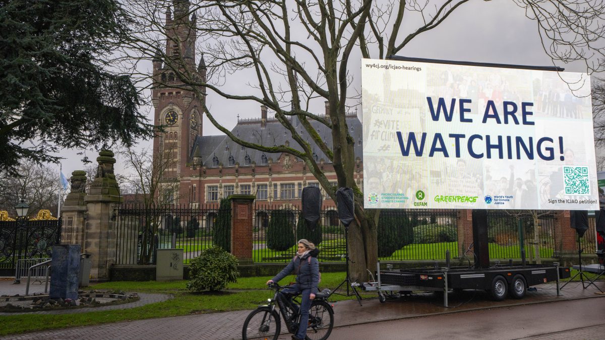 Activists put up a billboard outside the International Court of Justice, in The Hague, Netherlands, as it opens hearings into what countries worldwide are legally required to do to combat climate change and help vulnerable nations fight its devastating impact. AP Activists put up a billboard outside the International Court of Justice, in The Hague, Netherlands, as it opens hearings into what countries worldwide are legally required to do to combat climate change and help vulnerable nations fight its devastating impact. AP