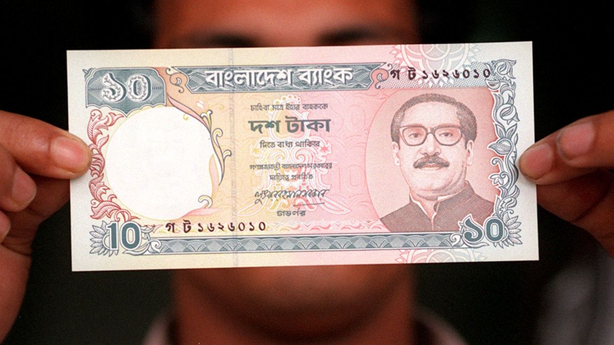 A local bank staff holds the a10 Taka currency issued by the central bank with the bust of Bangladesh's founder Sheikh Mujibur Rahman, who was assassinated in a 1975 military coup. Now, the interim government has ordered for new currency notes. File image/AFP A local bank staff holds the a10 Taka currency issued by the central bank with the bust of Bangladesh's founder Sheikh Mujibur Rahman, who was assassinated in a 1975 military coup. Now, the interim government has ordered for new currency notes. File image/AFP