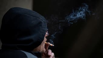 A person smokes a cigarette in London, UK, November 26, 2024. File Image/Reuters