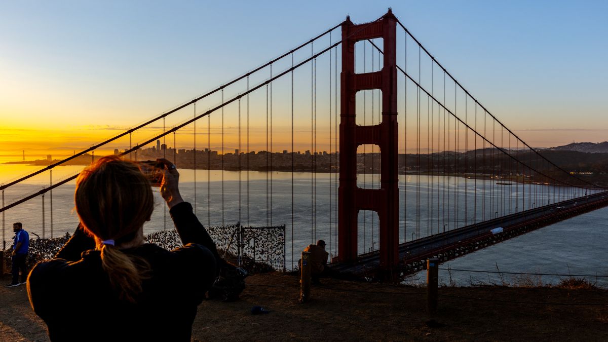 A onlooker takes a photo of the Golden Gate Bridge from Marin Headlands viewpoint in Marin County, California, US. Reuters A onlooker takes a photo of the Golden Gate Bridge from Marin Headlands viewpoint in Marin County, California, US. Reuters
