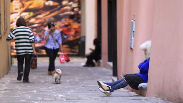 Why are young Italians leaving the country in large numbers? 