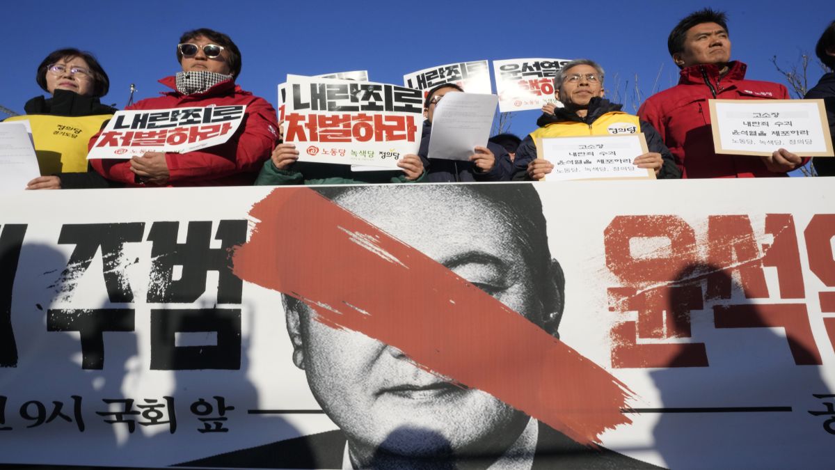 Protesters stage a rally to demand South Korean President Yoon Suk Yeol to step down in front of the National Assembly in Seoul, South Korea after he imposed martial law and then reversed it. Reuters Protesters stage a rally to demand South Korean President Yoon Suk Yeol to step down in front of the National Assembly in Seoul, South Korea after he imposed martial law and then reversed it. Reuters