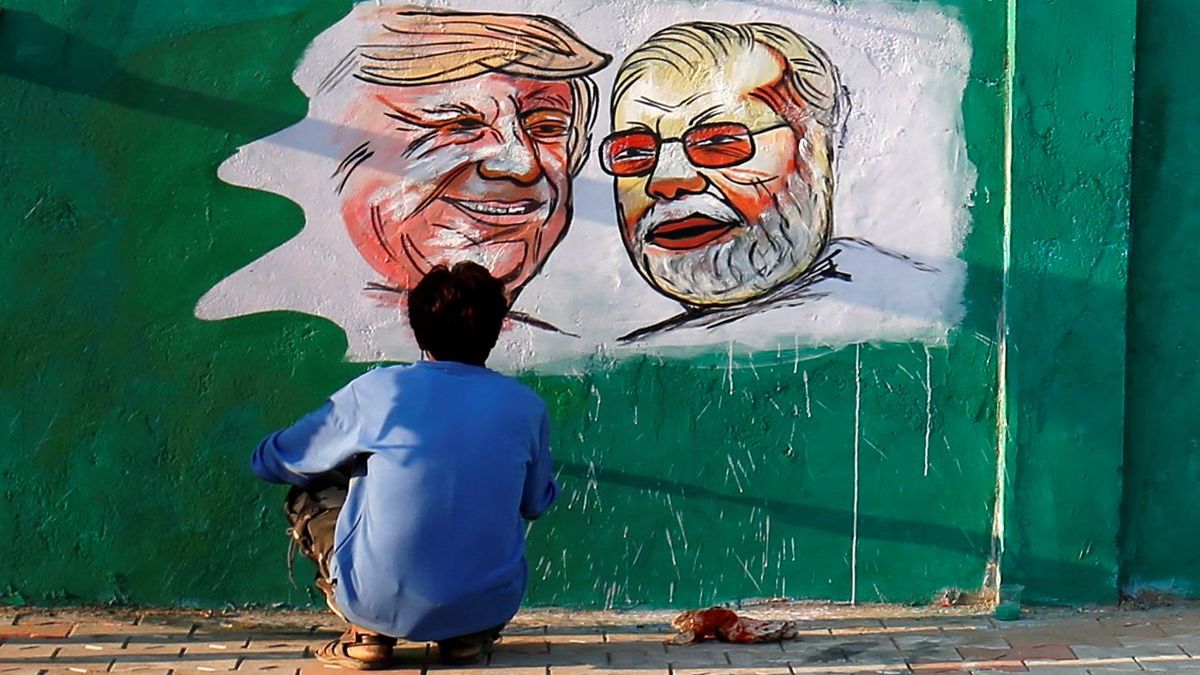A man applies finishing touches to a painting of US President-elect Donald Trump and Prime Minister Narendra Modi on a wall in Ahmedabad. Modi and Trump's bonhomie grabbed headlines during during the president's first time. File photo/Reuters A man applies finishing touches to a painting of US President-elect Donald Trump and Prime Minister Narendra Modi on a wall in Ahmedabad. Modi and Trump's bonhomie grabbed headlines during during the president's first time. File photo/Reuters