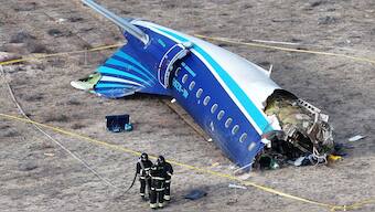 A drone view shows emergency specialists working at the crash site of an Azerbaijan Airlines passenger plane near the city of Aktau, Kazakhstan. Reuters