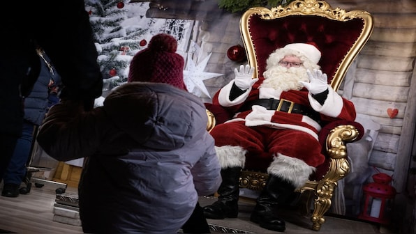 Why does Santa Claus wear red? The history behind his suit