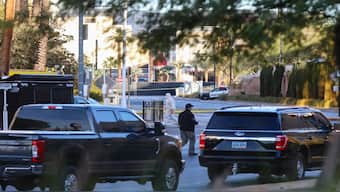 Investigators work at the scene where a Tesla Cybertruck exploded outside the lobby of President-elect Donald Trump's hotel on January 1, 2025, in Las Vegas. AFP