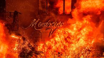 An apartment building burns during the Eaton fire in the Altadena area of Los Angeles county, California on January 08, 2025. AFP