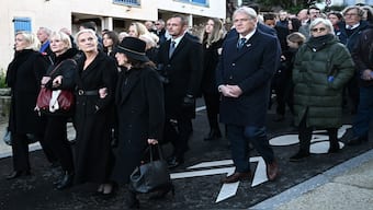 (From L) Jean-Marie Le Pen's daughters Marine Le Pen, Yann Le Pen, Marie-Caroline Le Pen and Jean-Marie Le Pen second's wife Jany Le Pen, followed by family and relatives, walk towards the cemetery during Jean-Marie Le Pen's burial in his hometown of La Trinite-sur-Mer on January 11, 2025. AFP