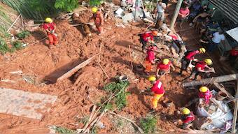 Aerial view of rescue teams working on a landslide site at Bethania neighborhood, Ipatinga, Minas Gerais state, Brazil on January 12, 2025. AFP