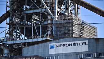 This photo shows signage on the exterior of a blast furnace building during a media tour by Japanese company Nippon Steel at their East Nippon Works Kashima Area facility in Kashima, Ibaraki prefecture, north of Tokyo on December 6, 2024. File Image; AFP