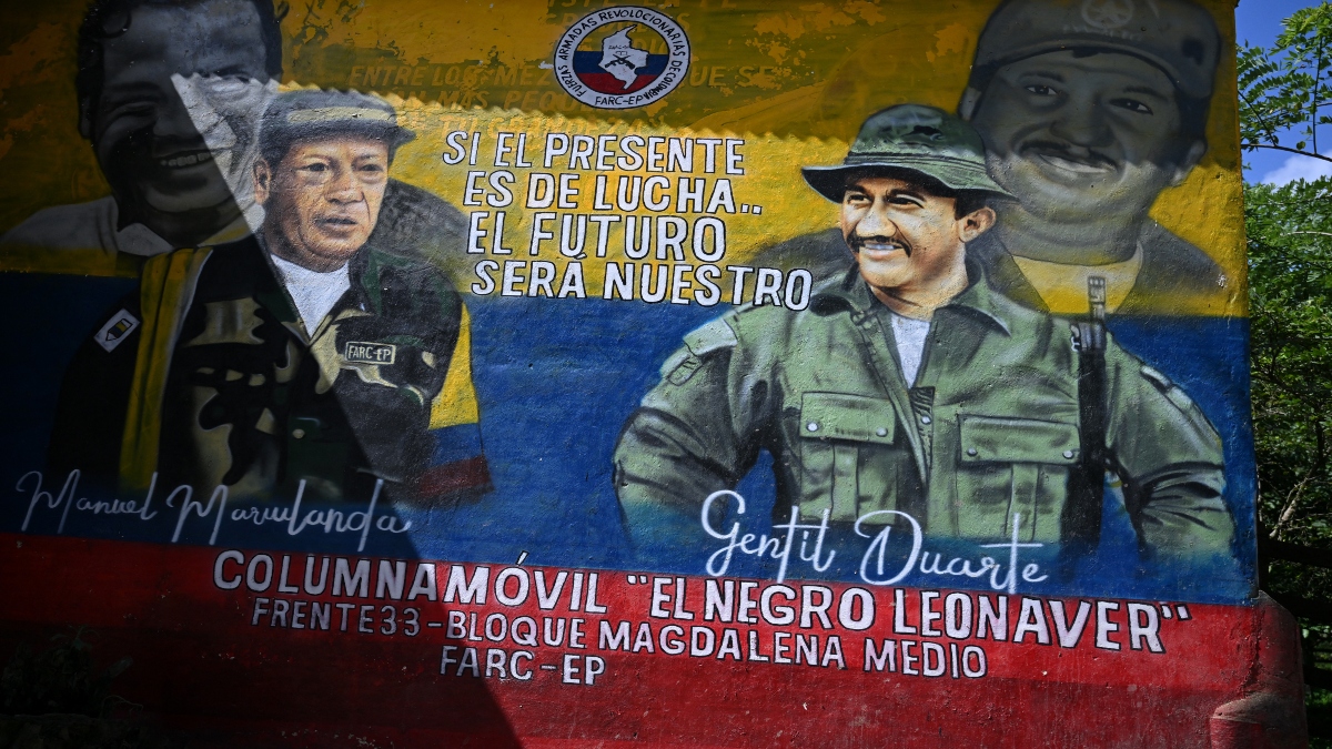 A mural with the images of Revolutionary Armed Forces of Colombia (FARC) late leader and founder Manuel Marulanda Velez (L) and Miguel Botache Santillana, alias Gentil Duarte, late leader of one of the structures of the dissidence of the extinct FARC, is seen in Teorama municipality, Catatumbo region, Norte de Santander department, Colombia, on January 23, 2025. AFP A mural with the images of Revolutionary Armed Forces of Colombia (FARC) late leader and founder Manuel Marulanda Velez (L) and Miguel Botache Santillana, alias Gentil Duarte, late leader of one of the structures of the dissidence of the extinct FARC, is seen in Teorama municipality, Catatumbo region, Norte de Santander department, Colombia, on January 23, 2025. AFP