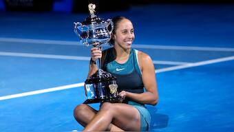 Madison Keys poses with the Australian Open trophy after beating Aryna Sabalenka in final. AP 