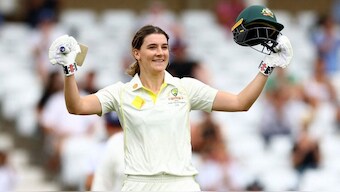 Annabel Sutherland celebrates reaching her century. Image: Reuters