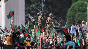 Anti-government protestors march towards ousted prime minister Sheikh Hasina's official residence in Dhaka, Bangladesh on August 5, 2024. Source: AFP.