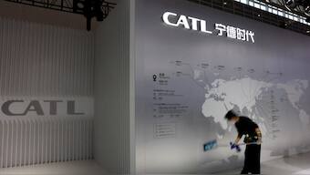 A staff member cleans a display showing the locations of battery maker CATL's production bases, at the CATL booth during the first China International Supply Chain Expo (CISCE) in Beijing, China. File image/ Reuters