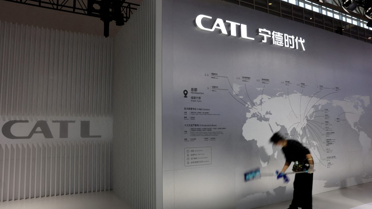A staff member cleans a display showing the locations of battery maker CATL's production bases, at the CATL booth during the first China International Supply Chain Expo (CISCE) in Beijing, China. File image/ Reuters A staff member cleans a display showing the locations of battery maker CATL's production bases, at the CATL booth during the first China International Supply Chain Expo (CISCE) in Beijing, China. File image/ Reuters