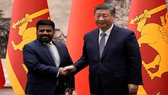 Chinese President Xi Jinping and Sri Lankan President Anura Kumara Dissanayake shake hands during a signing ceremony at the Great Hall of the People in Beijing, China on Wednesday. Reuters File