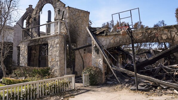 California wildfires: Rain brings good news to LA, but a potential headache too