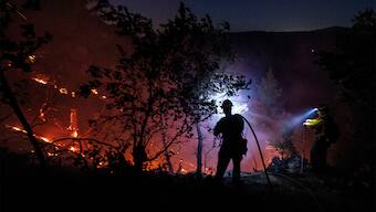 Firefighters battle the fire in the Angeles National Forest near Mt. Wilson as the wildfires burn in the Los Angeles area, during the Eaton Fire in Altadena, California, US on January 9, 2025. Reuters