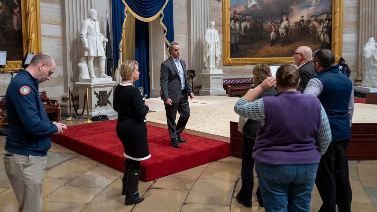 Officials inspect the construction of a stand in the Rotunda, where US President-elect Donald Trump is due to take the oath of office on Monday, at the Capitol in Washington, January 17, 2025. File Image/AP