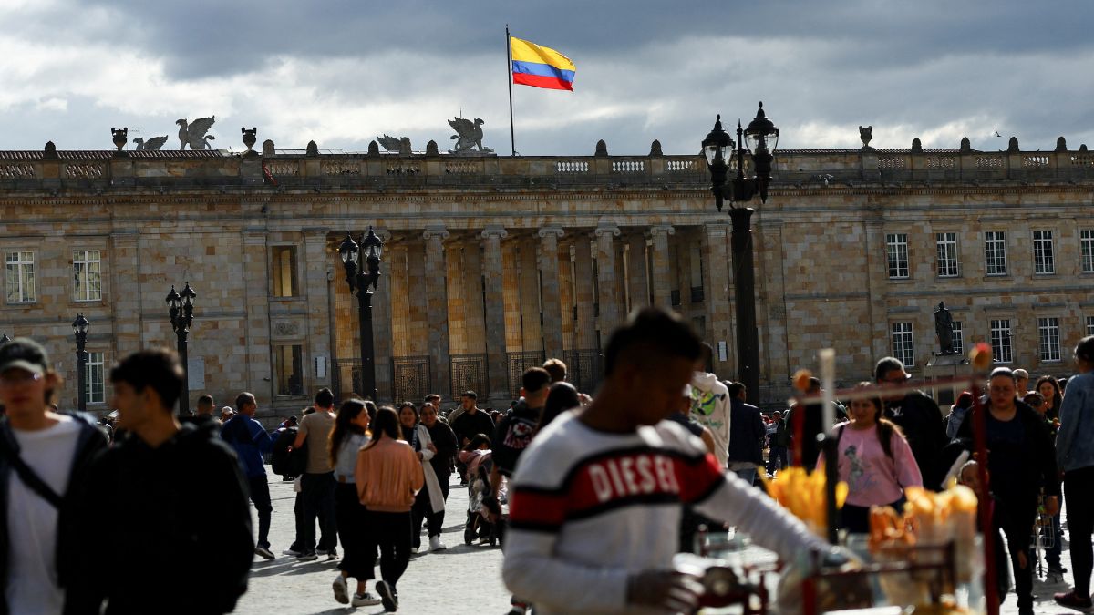 People walk at Plaza Bolivar on the day US President Donald Trump announced to impose tariffs and sanctions after Colombian President Gustavo Petro refused to allow flights with deported Colombians to enter the country, in Bogota, Colombia, January 26, 2025. File Image/Reuters People walk at Plaza Bolivar on the day US President Donald Trump announced to impose tariffs and sanctions after Colombian President Gustavo Petro refused to allow flights with deported Colombians to enter the country, in Bogota, Colombia, January 26, 2025. File Image/Reuters