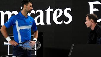 Novak Djokovic talks with coach Andy Murray during his first round match against Nishesh Basavareddy at the Australian Open in Melbourne. AP  