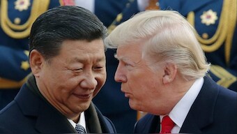 File photo of Donald Trump and Chinese President Xi Jinping in Beijing. Source: AP.