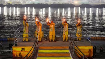 Priests perform 'Ganga Aarti' at a 'ghat' ahead of Maha Kumbh Mela 2025, in Prayagraj. PTI/File image