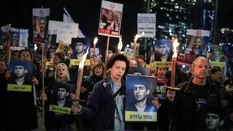 Supporters of Israeli hostages, kidnapped during the deadly October 7, 2023 attack by Hamas, hold pictures of hostages and of Ron Arad, an Israeli air force navigator missing since he bailed out over Lebanon in 1986, as they demand a deal during a protest amid ongoing negotiations for a ceasefire in Gaza, in Tel Aviv, Israel January 13, 2025. (Photo: Reuters) 