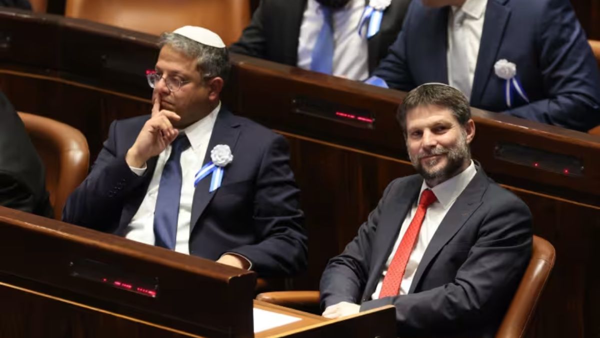In this photo taken on November 15, 2022, then-Knesset members Itamar Ben Gvir (L) and Bezalel Smotrich look on during the swearing-in ceremony for Israeli lawmakers in Jerusalem. (Photo: AP) In this photo taken on November 15, 2022, then-Knesset members Itamar Ben Gvir (L) and Bezalel Smotrich look on during the swearing-in ceremony for Israeli lawmakers in Jerusalem. (Photo: AP)