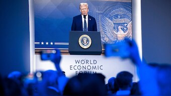 US President Donald J Trump is shown on screens as he addresses via remote connection a plenary session in the Congress Hall, during the 55th annual meeting of the World Economic Forum (WEF), in Davos, Switzerland, Thursday, Jan. 23, 2025. (Photo: AP)