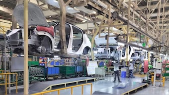Employees assemble different parts onto car panels at an assembly line inside the manufacturing plant of Renault Nissan Automotive India in Oragadam in the southern state of Tamil Nadu, India, March 27, 2024. (Photo: Reuters)
