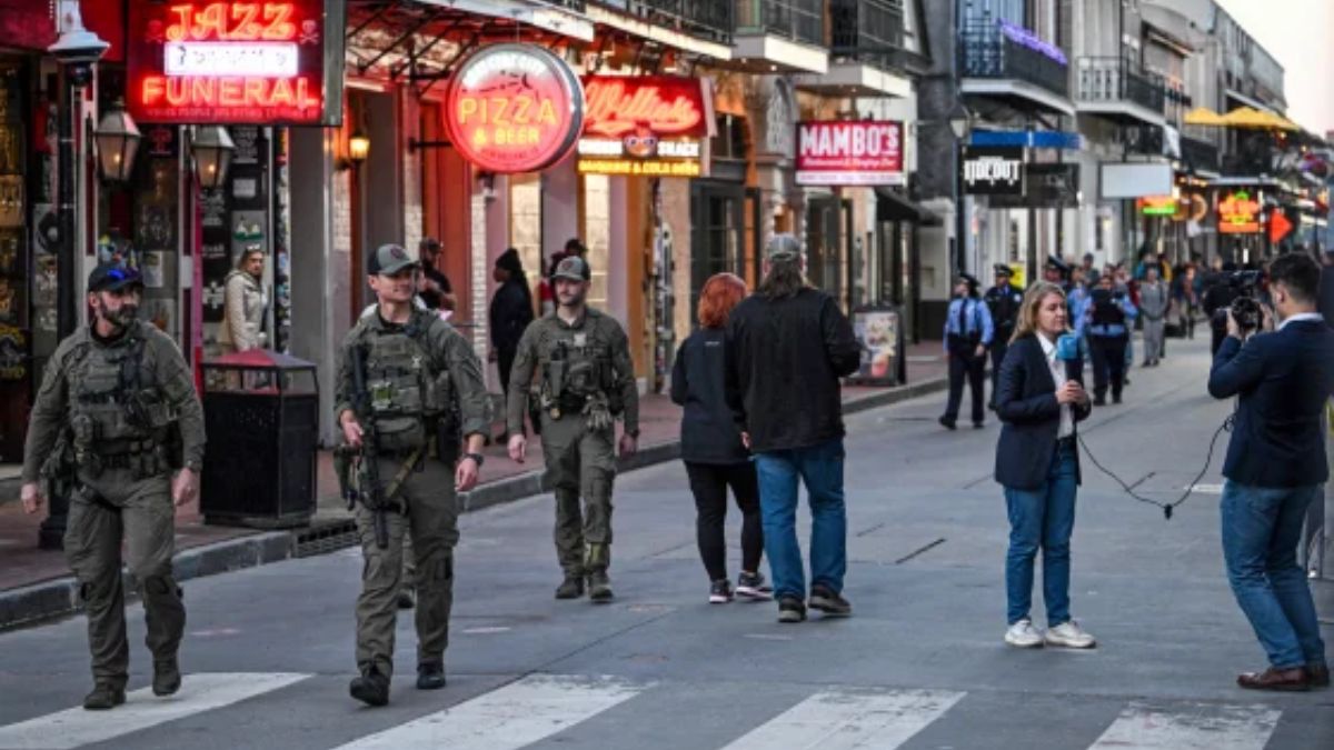 Police walk down Bourbon Street past reporters in New Orleans on Thursday, the day after an attacker drove into crowds on the street. (Photo: AFP) Police walk down Bourbon Street past reporters in New Orleans on Thursday, the day after an attacker drove into crowds on the street. (Photo: AFP)