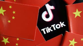 China's flags are seen near a TikTok logo in this illustration picture taken July 16, 2020. (Photo: Reuters)