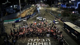 Supporters of Israeli hostages, kidnapped during the deadly October 7 2023 attack by Hamas, block a road as they demand a deal during a protest amid ongoing negotiations for a ceasefire in Gaza, in Tel Aviv, Israel. Reuters