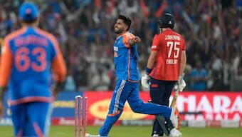 India pacer Harshit Rana celebrates after dismissing England's Jamie Overton during the fourth T20I in Pune on Friday, 31 January. AP