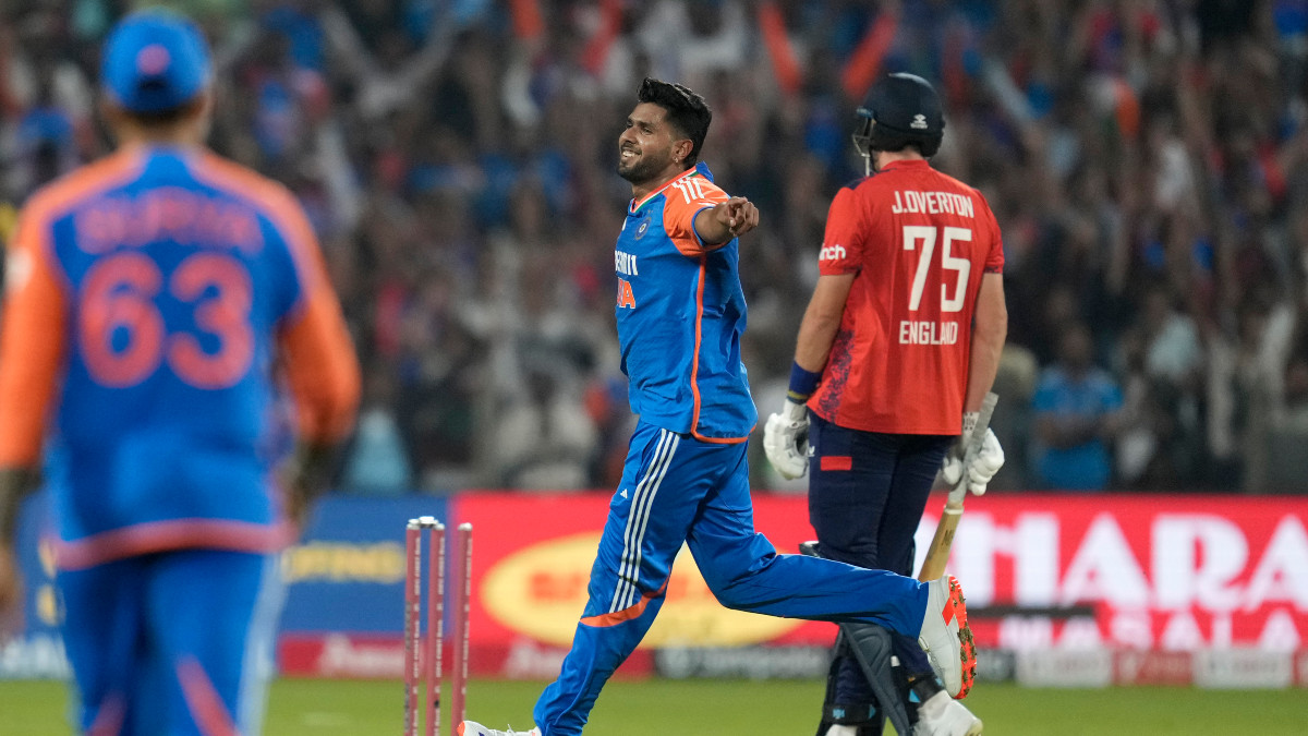 India pacer Harshit Rana celebrates after dismissing England's Jamie Overton during the fourth T20I in Pune on Friday, 31 January. AP India pacer Harshit Rana celebrates after dismissing England's Jamie Overton during the fourth T20I in Pune on Friday, 31 January. AP