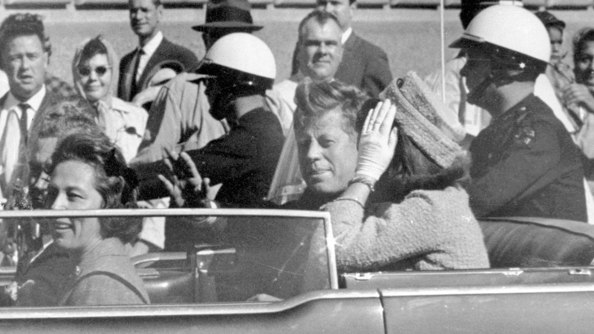 US President John F Kennedy waves from his car in a motorcade in Dallas, with first lady Jacqueline Kennedy, right, Nellie Connally, second from left, and her husband, Texas Governor John Connally, far left, November 22, 1963. File Image/AP US President John F Kennedy waves from his car in a motorcade in Dallas, with first lady Jacqueline Kennedy, right, Nellie Connally, second from left, and her husband, Texas Governor John Connally, far left, November 22, 1963. File Image/AP