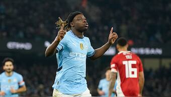 Manchester City's Jeremy Doku celebrates after scoring against Salford in their FA Cup third-round match at the Etihad Stadium. AP