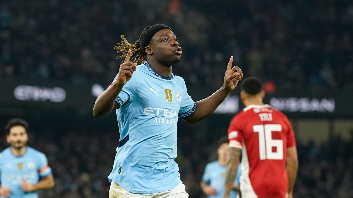 Manchester City's Jeremy Doku celebrates after scoring against Salford in their FA Cup third-round match at the Etihad Stadium. AP Manchester City's Jeremy Doku celebrates after scoring against Salford in their FA Cup third-round match at the Etihad Stadium. AP