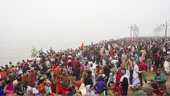 Devotees gather to take a holy dip at the Sangam on the first day of Maha Kumbh Mela 2025, in Prayagraj, Uttar Pradesh. PTI