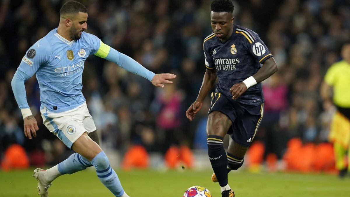 Kyle Walker and Vinicius Junior fight for the ball. Image: AP Kyle Walker and Vinicius Junior fight for the ball. Image: AP