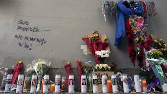 A memorial for the victims of a deadly truck attack on New Year's Day stands on the sidewalk in the French Quarter of New Orleans. AP