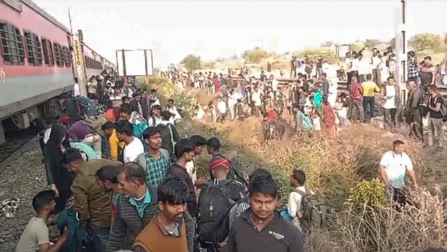 People gather at the site following the death of several passengers after they stepped down due to a rumour of fire and were run over by another train passing on the adjacent tracks, in North Maharashtra's Jalgaon district, Wednesday, January 22, 2025. PTI