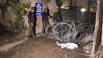 Security personnel at a containment zone after the outbreak of a mysterious illness, in Rajouri district, Jammu and Kashmir, Wednesday, January 22, 2025. PTI