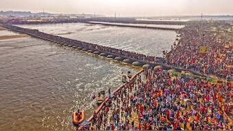 Devotees gather to take a holy dip at the Sangam during Maha Kumbh Mela 2025, in Prayagraj, Uttar Pradesh, Monday, January 27, 2025. PTI