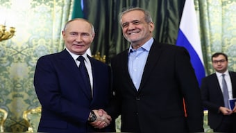 Russian President Vladimir Putin with Iranian President Masoud Pezeshkian in Moscow, Russia. Reuters File 