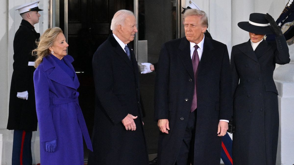 US President Joe Biden, First Lady Jill Biden (L) poses with President-elect Donald Trump (2nd R) and wife Melania Trump (R) as they arrive at the White House in Washington, DC, on January 20, 2025 US President Joe Biden, First Lady Jill Biden (L) poses with President-elect Donald Trump (2nd R) and wife Melania Trump (R) as they arrive at the White House in Washington, DC, on January 20, 2025